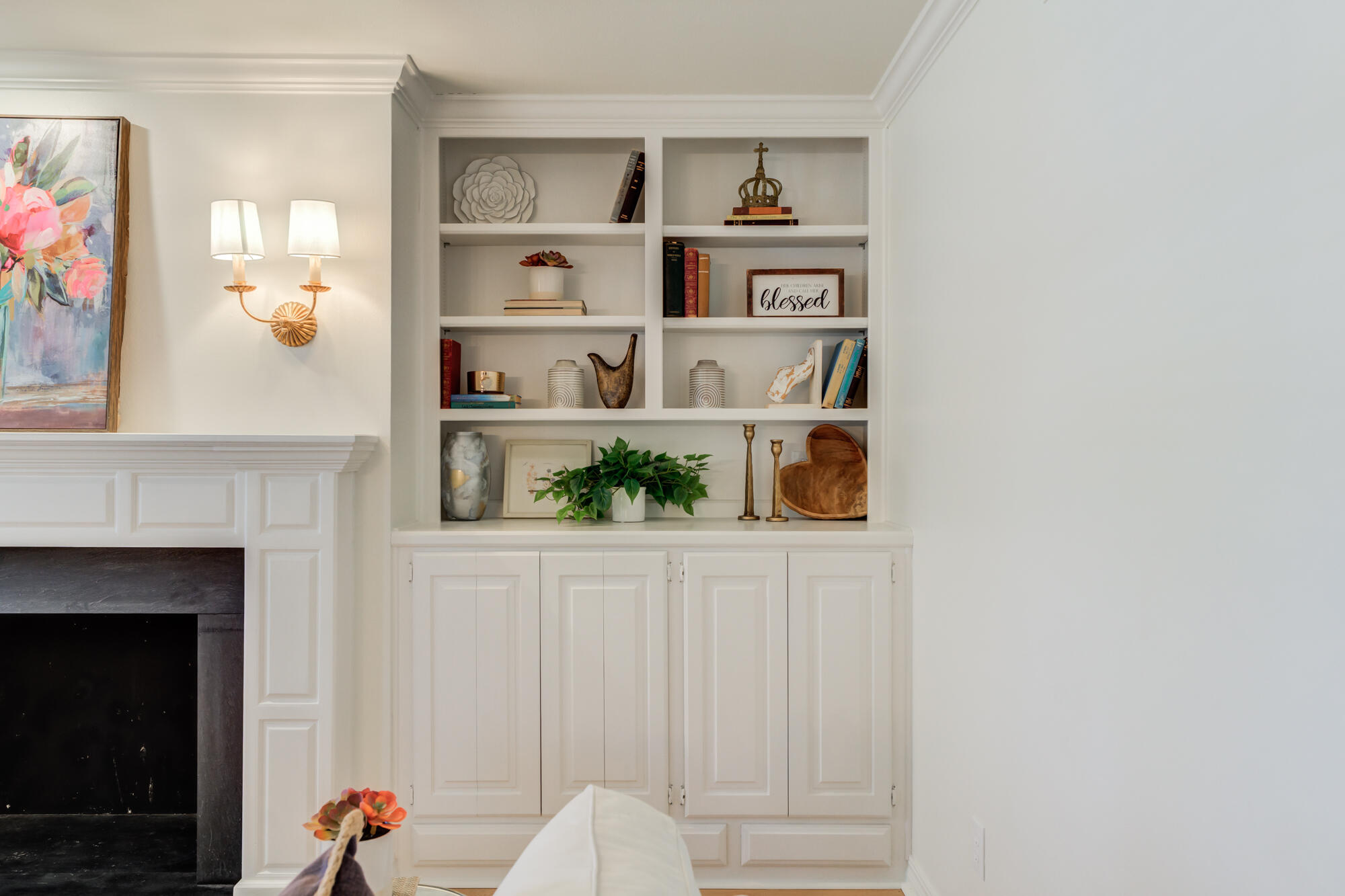 4407 13th Street Lubbock, TX 79416 - Photo 16 of 88 a living room with painting and a fireplace