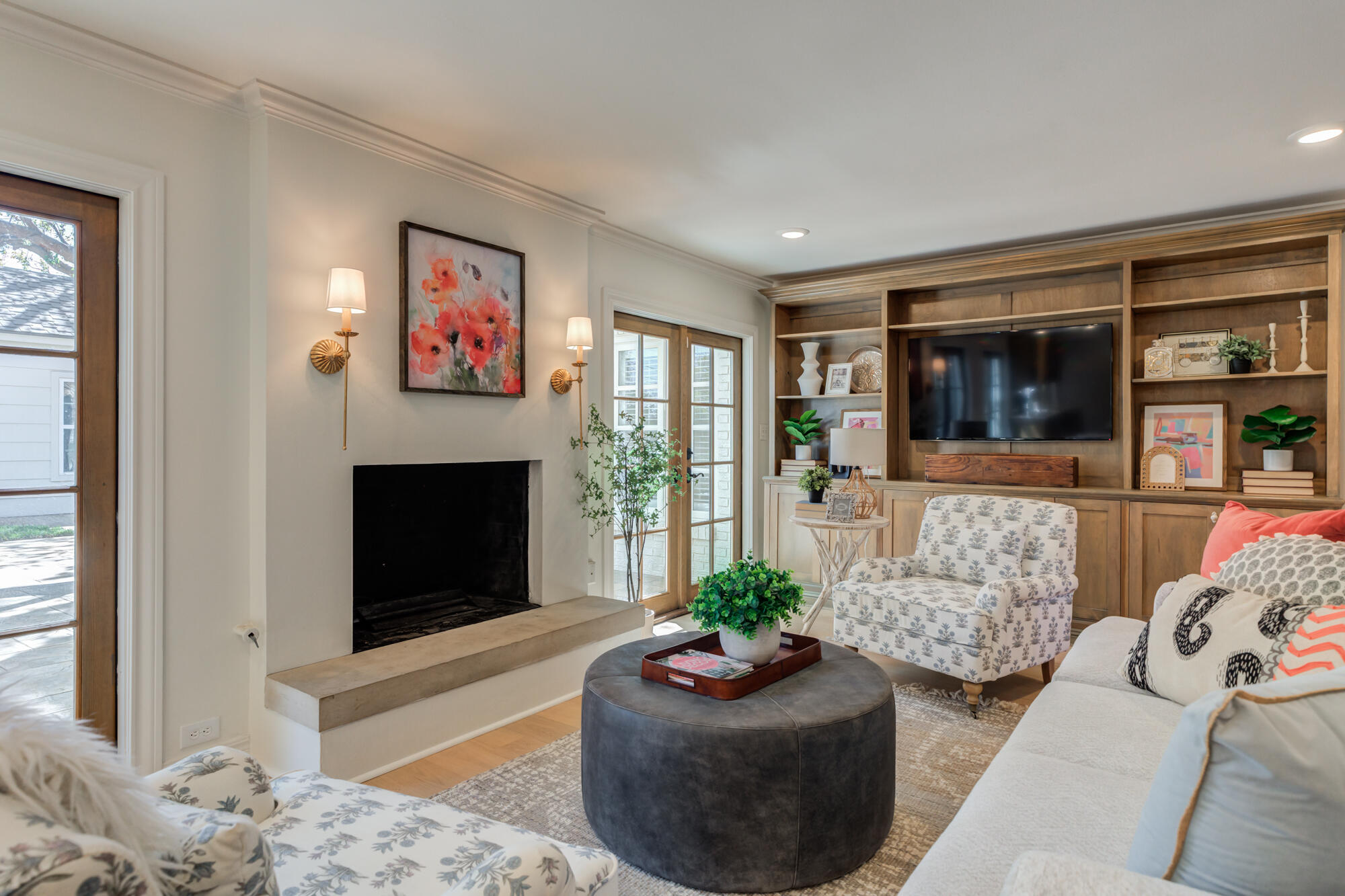 4407 13th Street Lubbock, TX 79416 - Photo 19 of 88 a living room with furniture and a fireplace