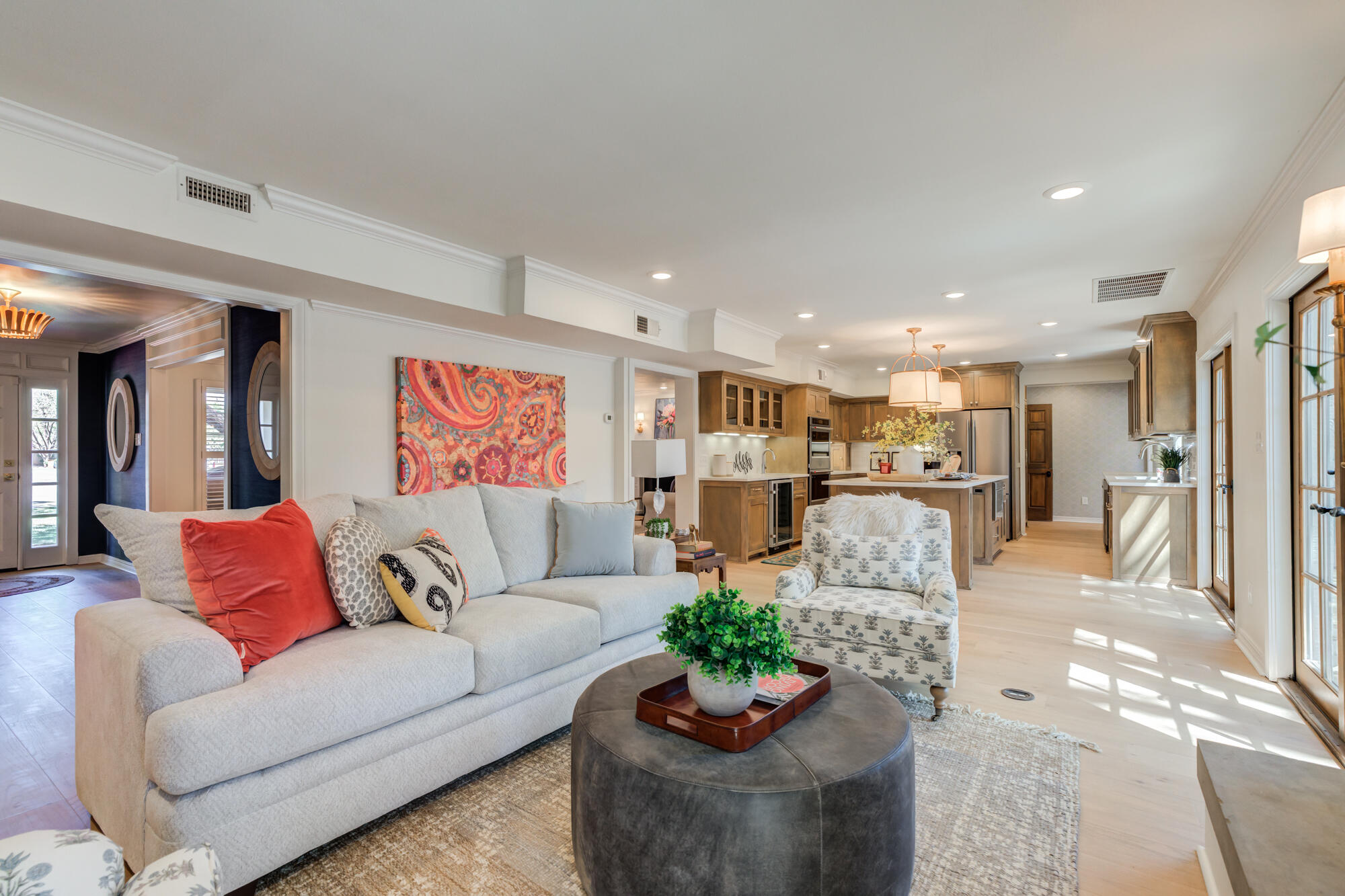 4407 13th Street Lubbock, TX 79416 - Photo 22 of 88 a living room with furniture and a potted plant