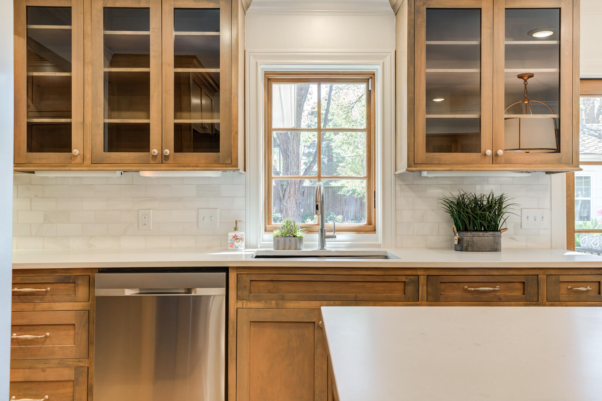 4407 13th Street Lubbock, TX 79416 - Photo 33 of 88 a sink a mirror and window
