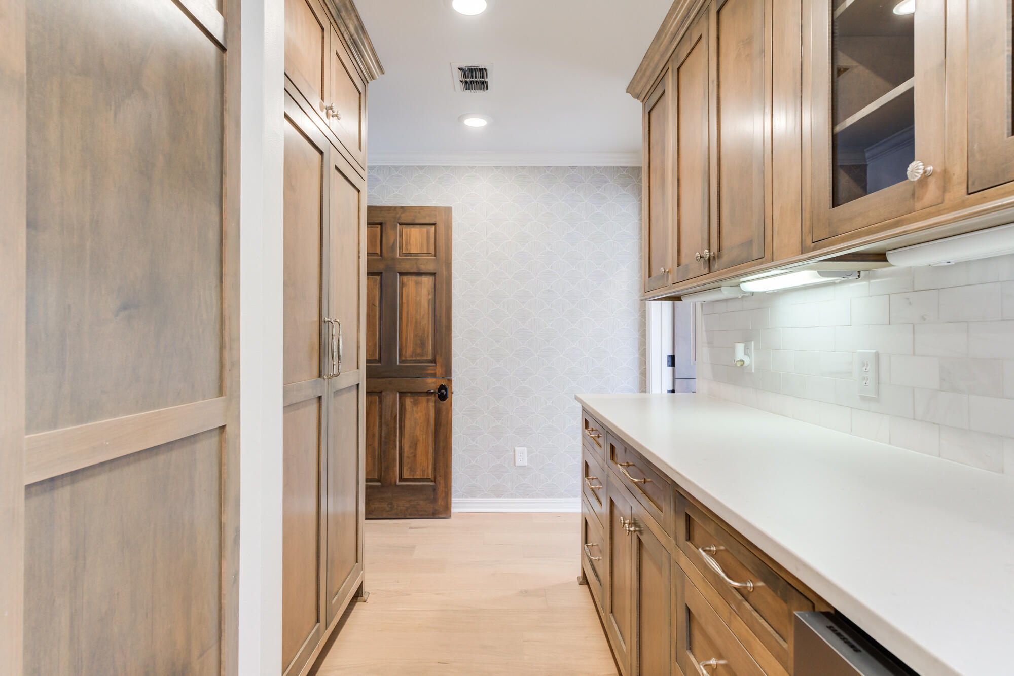 4407 13th Street Lubbock, TX 79416 - Photo 36 of 88 a kitchen with stainless steel appliances granite countertop a sink and a refrigerator