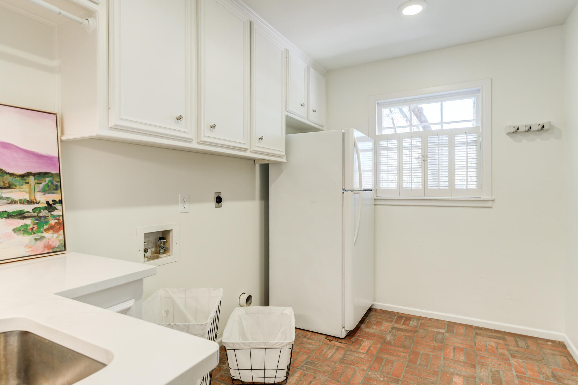 4407 13th Street Lubbock, TX 79416 - Photo 37 of 88 a bathroom with a sink and a toilet
