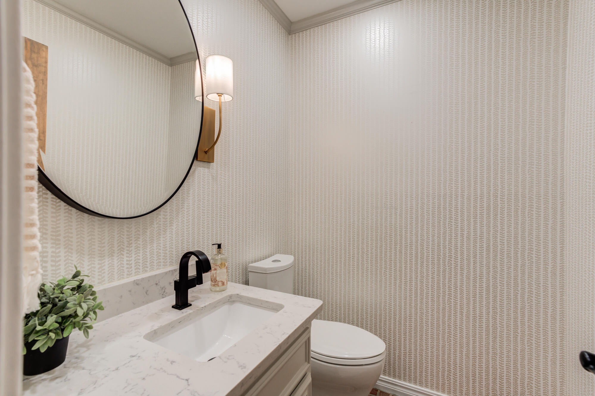 4407 13th Street Lubbock, TX 79416 - Photo 42 of 88 a bathroom with a sink and a mirror