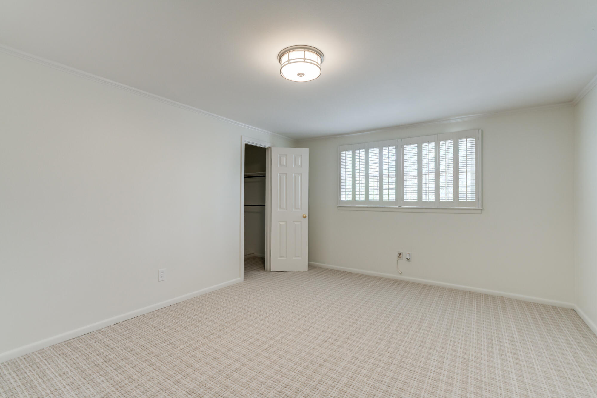 4407 13th Street Lubbock, TX 79416 - Photo 58 of 88 an empty room with windows and closet