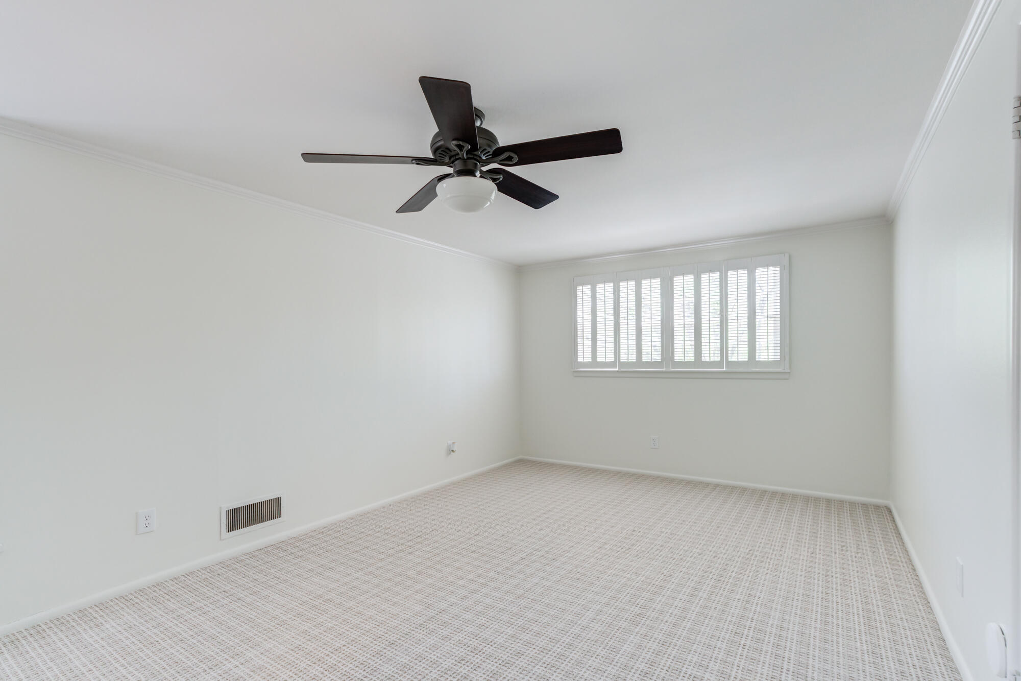 4407 13th Street Lubbock, TX 79416 - Photo 64 of 88 an empty room with windows and fan