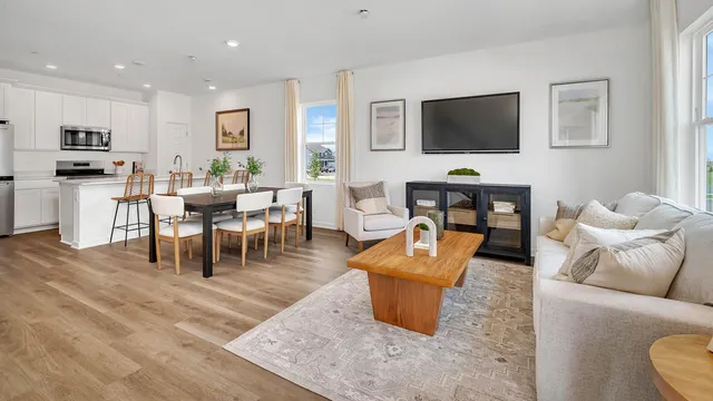 a living room with fireplace furniture and a flat screen tv