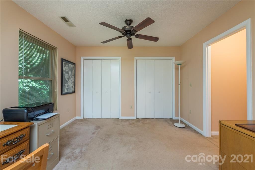 31 Bear Trail Fairview, NC 28730 - Photo 28 of 48 a living room with furniture and a window