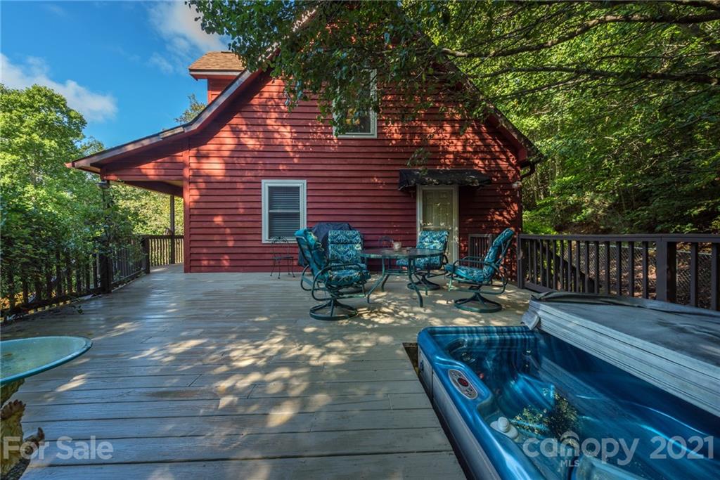 31 Bear Trail Fairview, NC 28730 - Photo 4 of 48 a backyard of a house with seating space