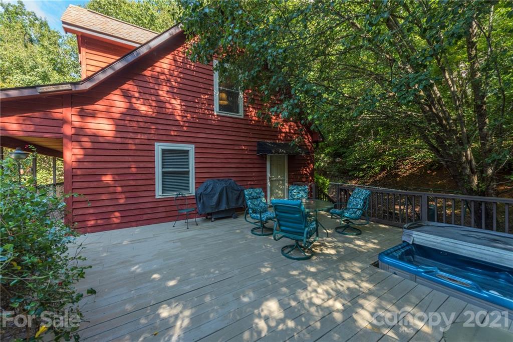 31 Bear Trail Fairview, NC 28730 - Photo 32 of 48 a backyard of a house with seating space