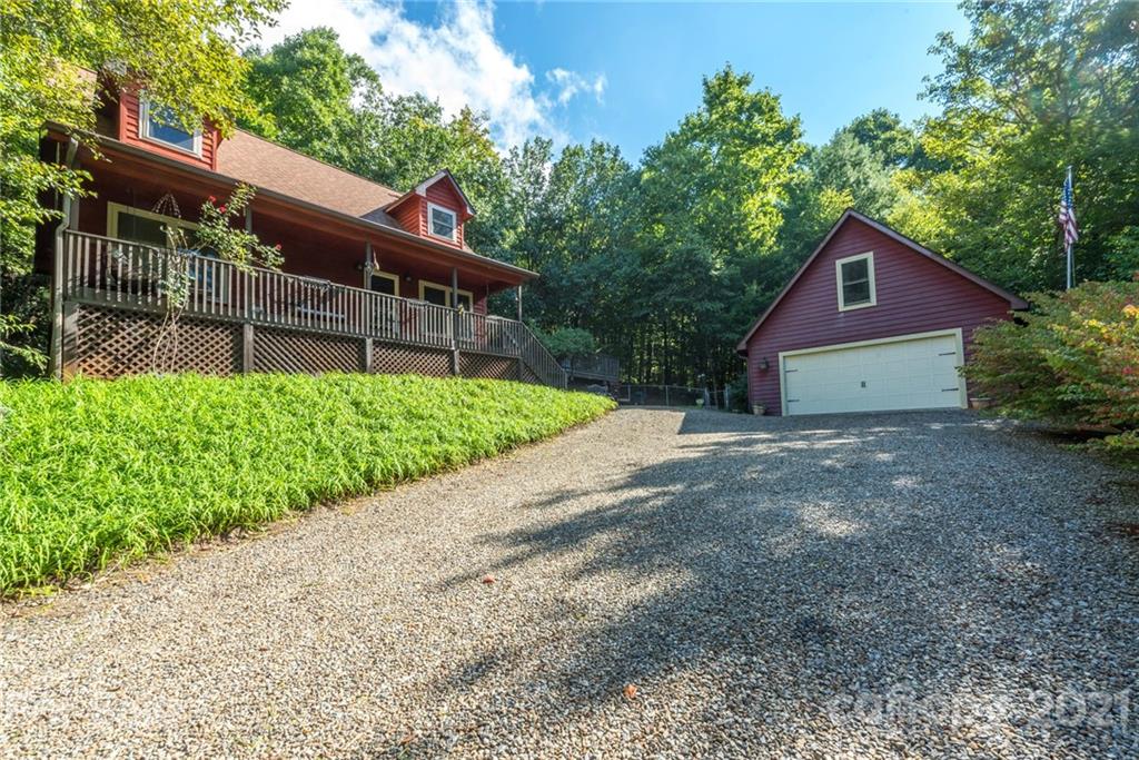 31 Bear Trail Fairview, NC 28730 - Photo 38 of 48 a front view of a house with a garden