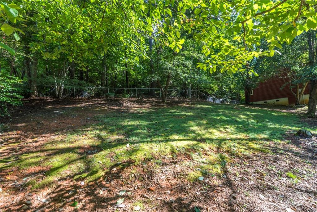 31 Bear Trail Fairview, NC 28730 - Photo 43 of 48 a view of a tree in a yard