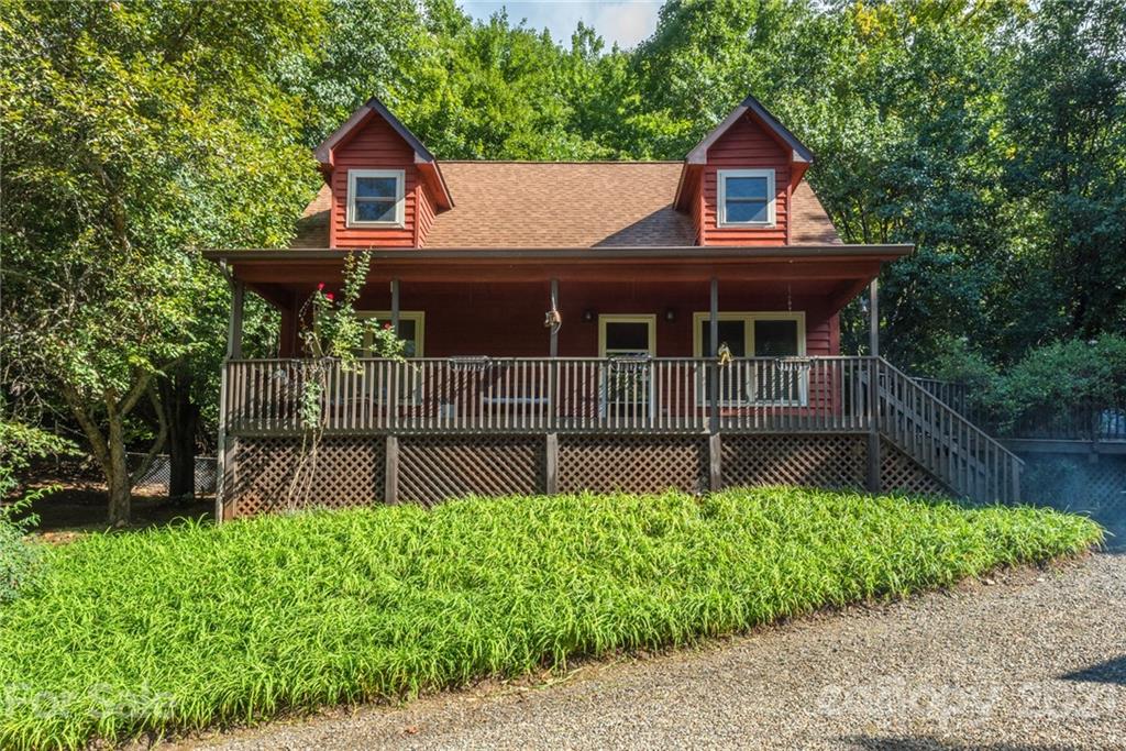 31 Bear Trail Fairview, NC 28730 - Photo 48 of 48 a front view of a house with garden