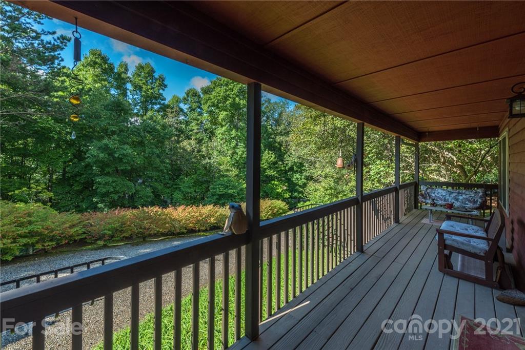 31 Bear Trail Fairview, NC 28730 - Photo 8 of 48 a view of a balcony with wooden floor