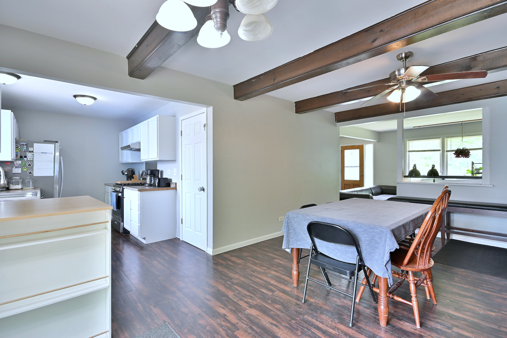 518 Emerson Circle Bolingbrook, IL 60440 - Photo 11 of 29 a view of a dining room with furniture and wooden floor