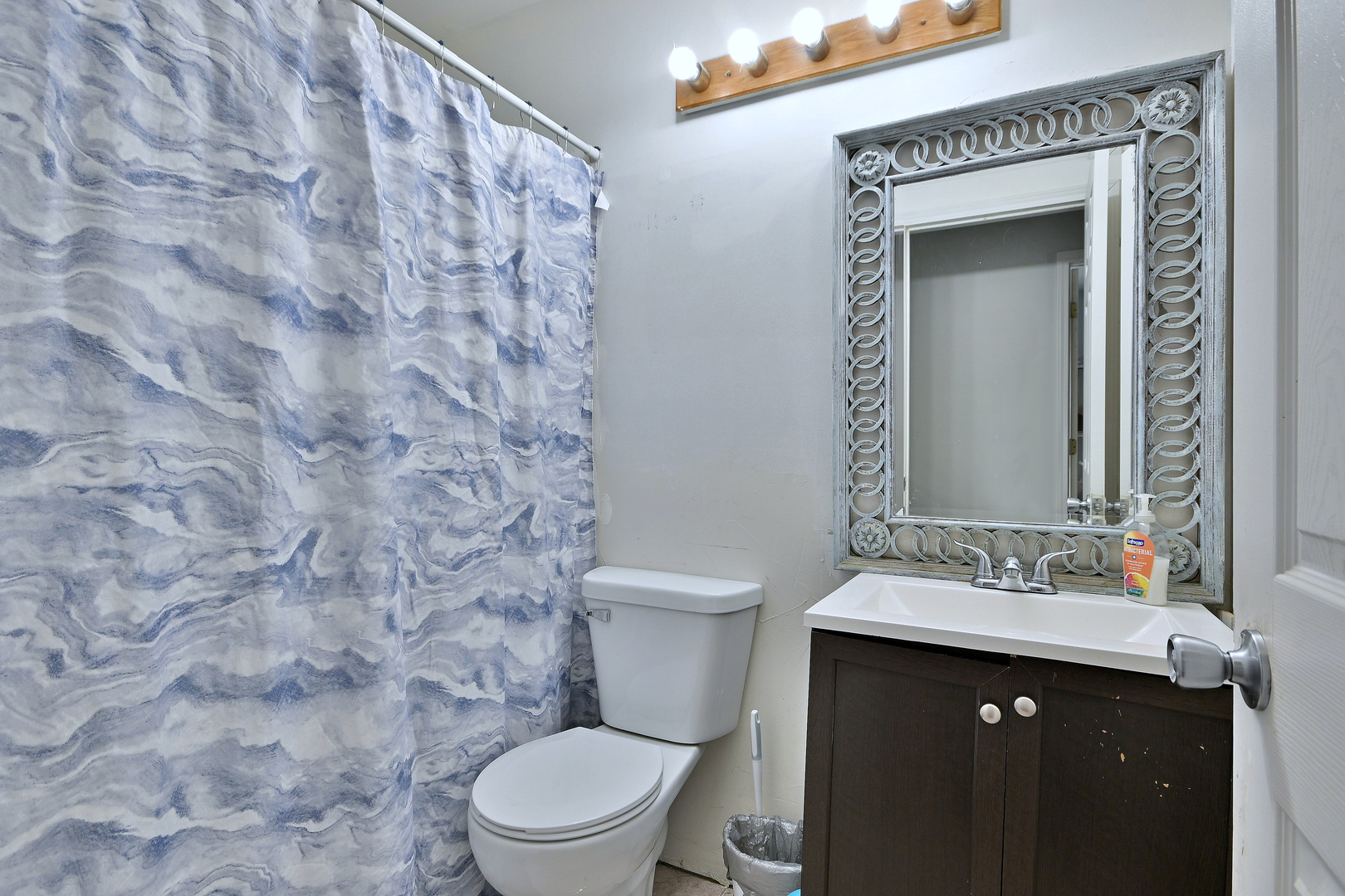 518 Emerson Circle Bolingbrook, IL 60440 - Photo 19 of 29 a bathroom with a granite countertop toilet sink and mirror