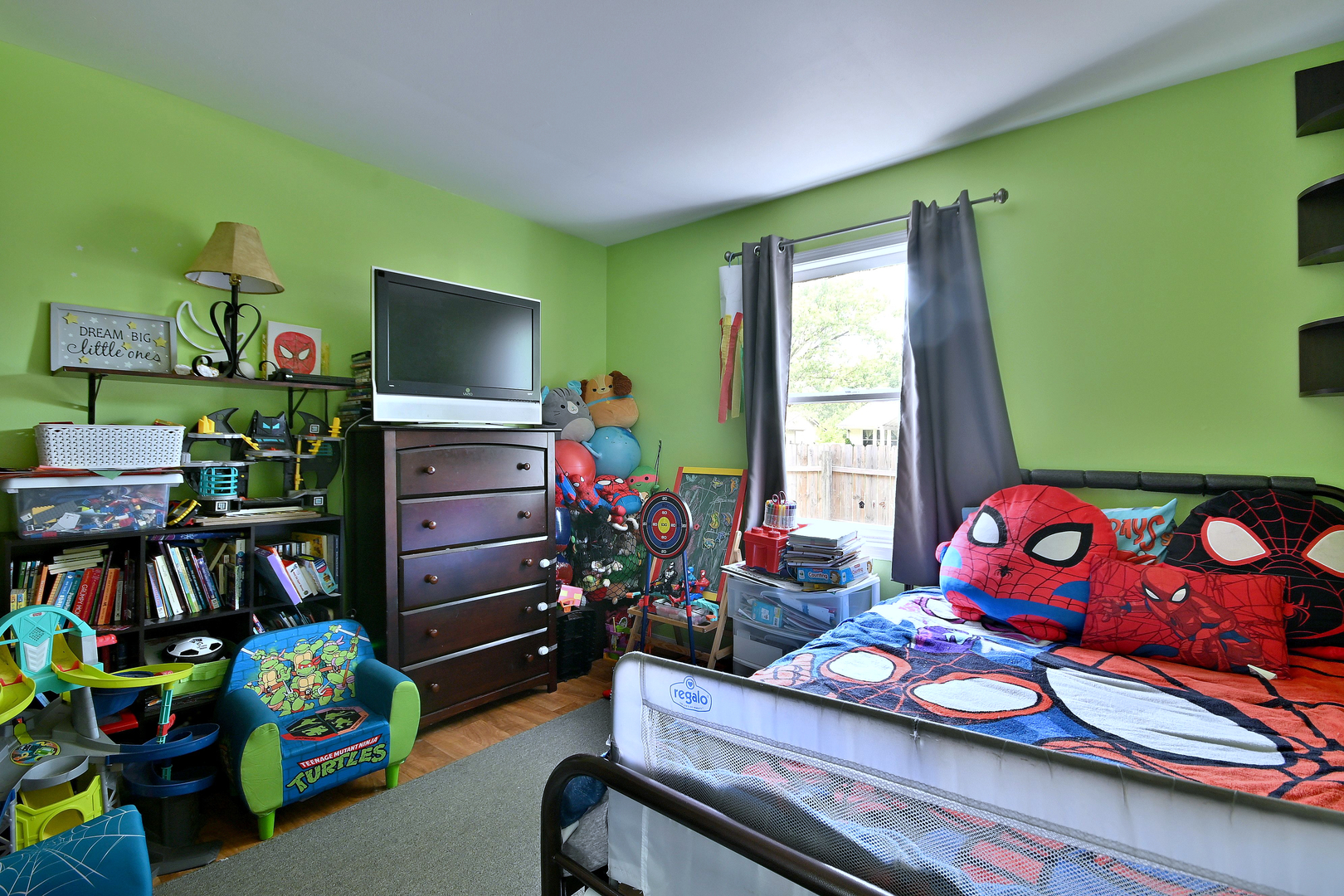 518 Emerson Circle Bolingbrook, IL 60440 - Photo 22 of 29 a bedroom with furniture and a flat screen tv
