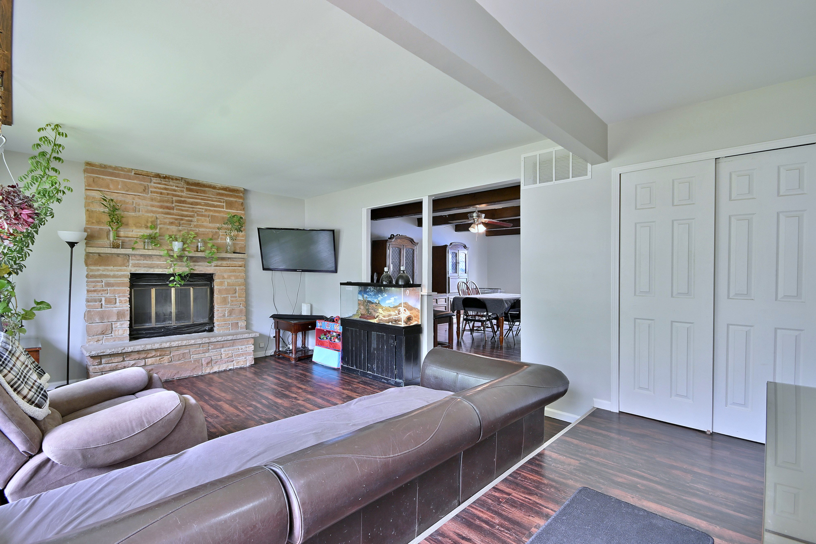 518 Emerson Circle Bolingbrook, IL 60440 - Photo 3 of 29 a living room with furniture or couch and a fireplace