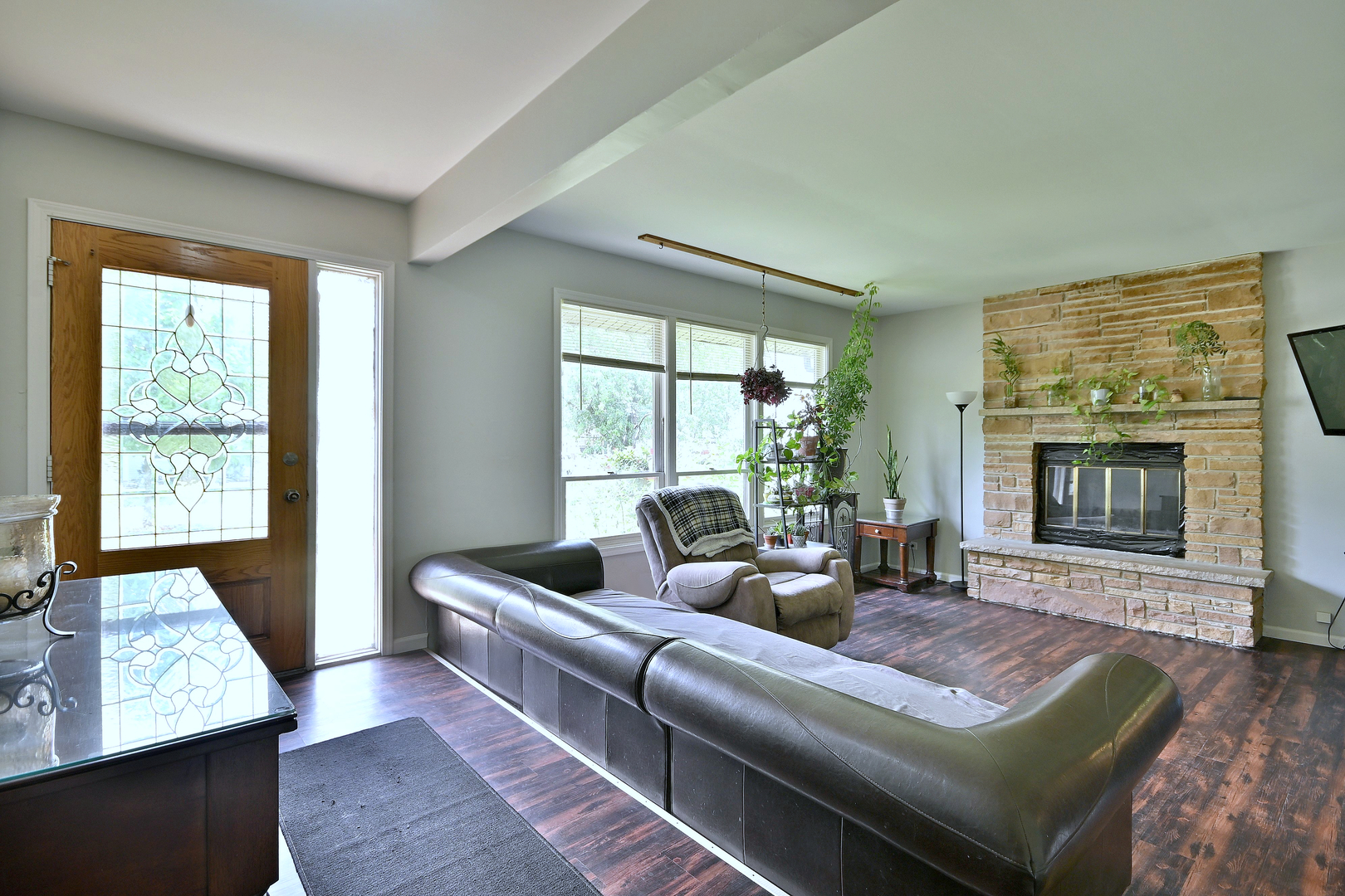518 Emerson Circle Bolingbrook, IL 60440 - Photo 5 of 29 a living room with furniture and a fireplace