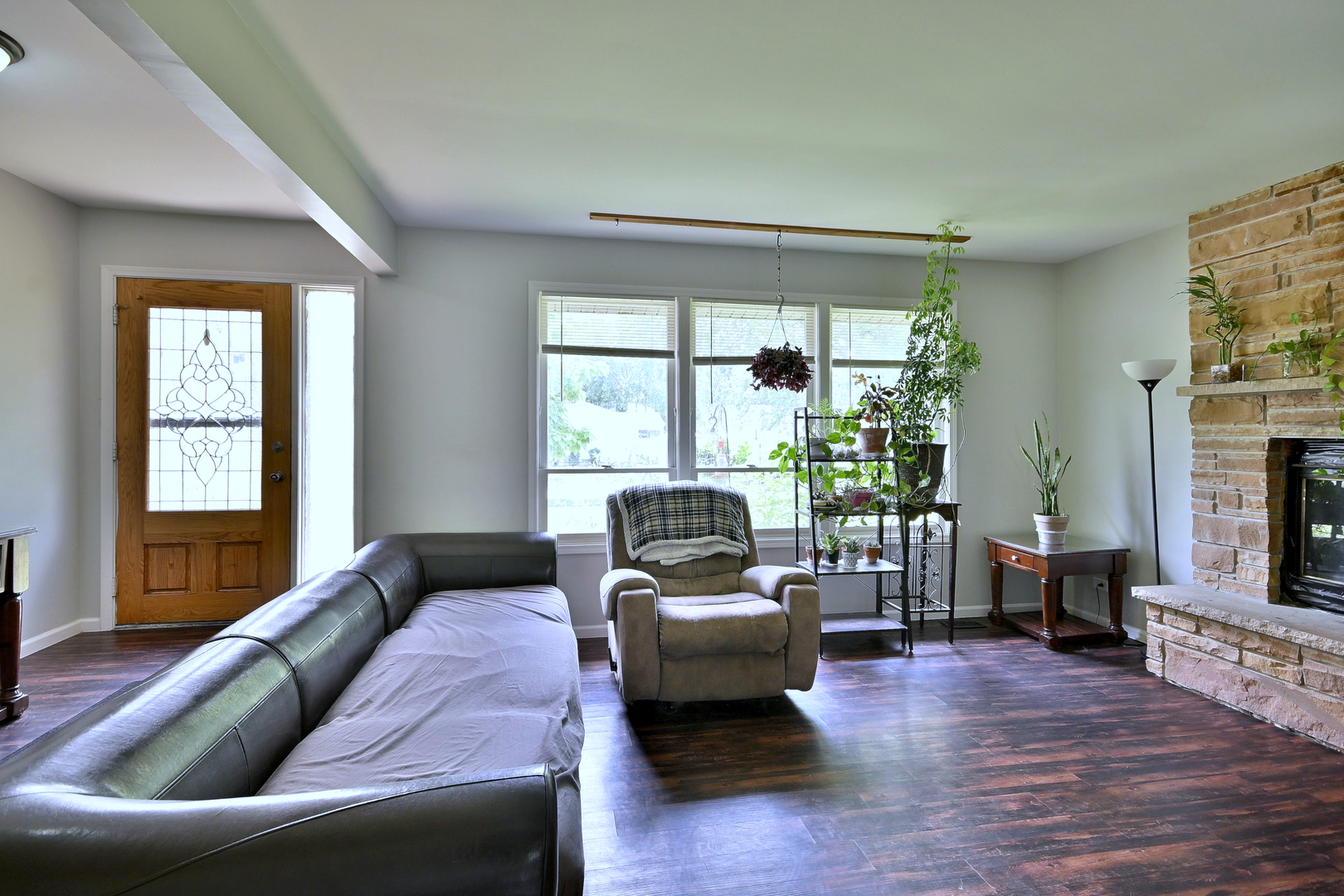 518 Emerson Circle Bolingbrook, IL 60440 - Photo 8 of 29 a living room with furniture and a fireplace
