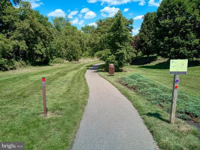 a garden view with a seating space