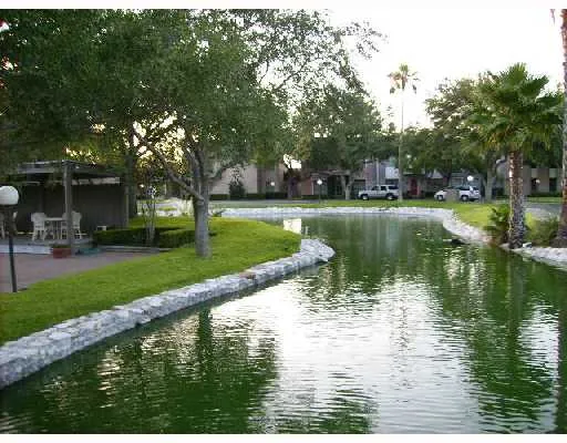 a view of a lake view with a garden
