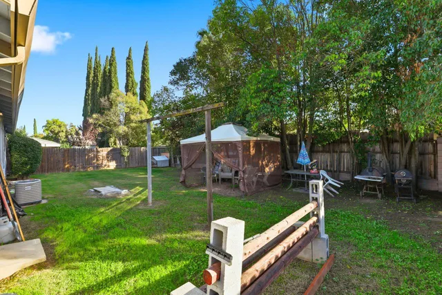 a view of a garden with patio