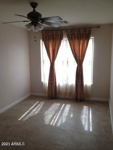 an empty room with windows