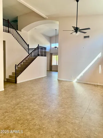 a view of a hall with stairs