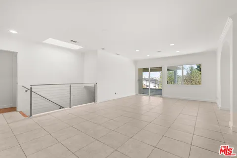 a view of a patio filled with furniture