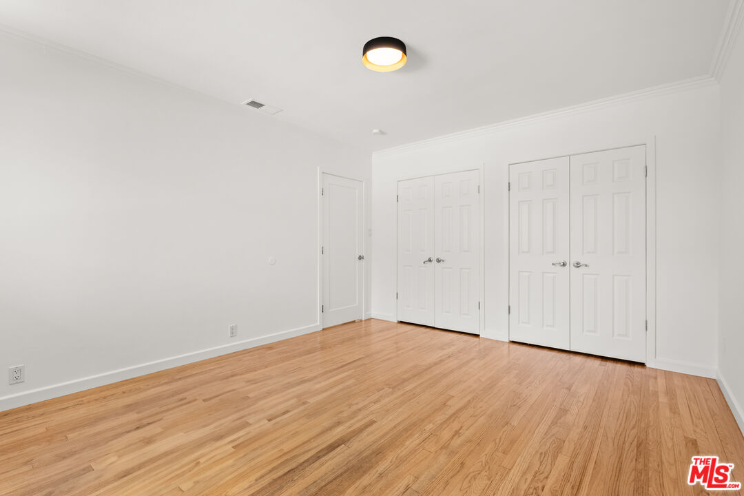 608 Lomita Street El Segundo, CA 90245 - Photo 24 of 37 a view of a room with wooden floor