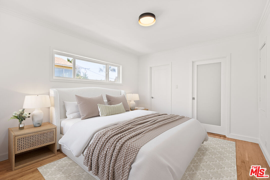 608 Lomita Street El Segundo, CA 90245 - Photo 27 of 37 a bedroom with a bed and a couch