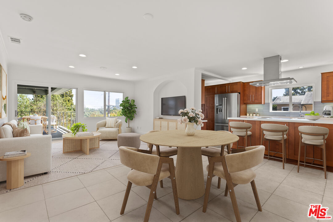 608 Lomita Street El Segundo, CA 90245 - Photo 6 of 37 a view of a dining room with furniture window and outside view