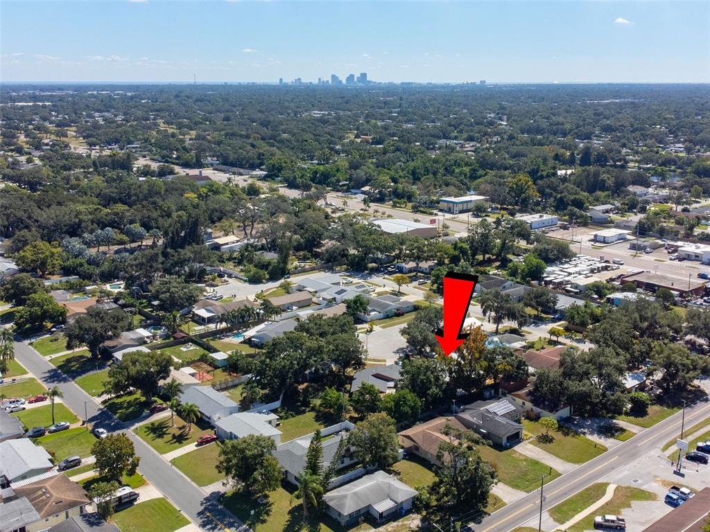 5558 57th Way Kenneth City, FL 33709 - Photo 30 of 33 an aerial view of multiple house