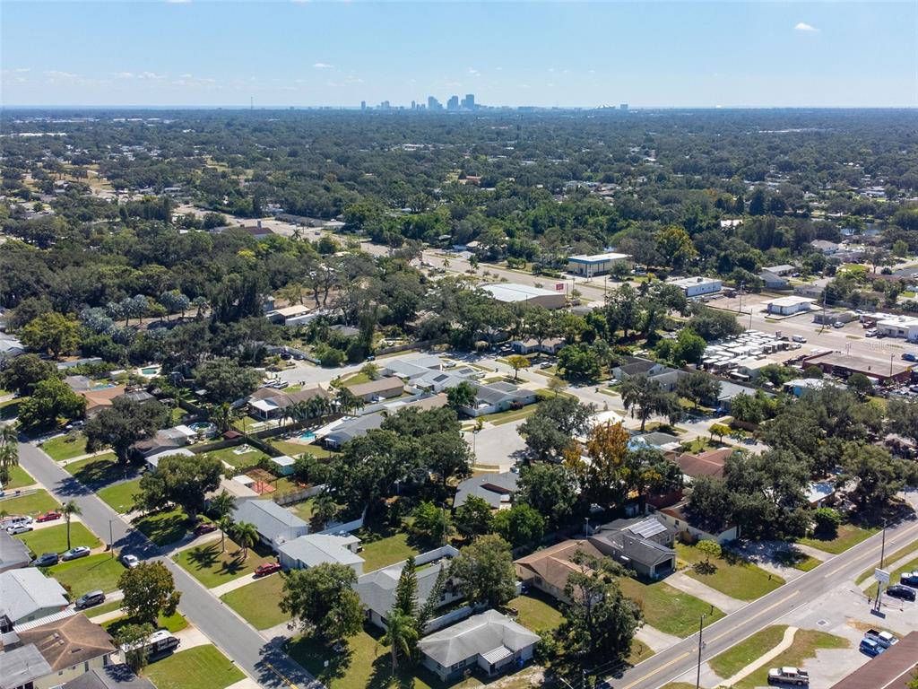 5558 57th Way Kenneth City, FL 33709 - Photo 31 of 33 an aerial view of multiple house