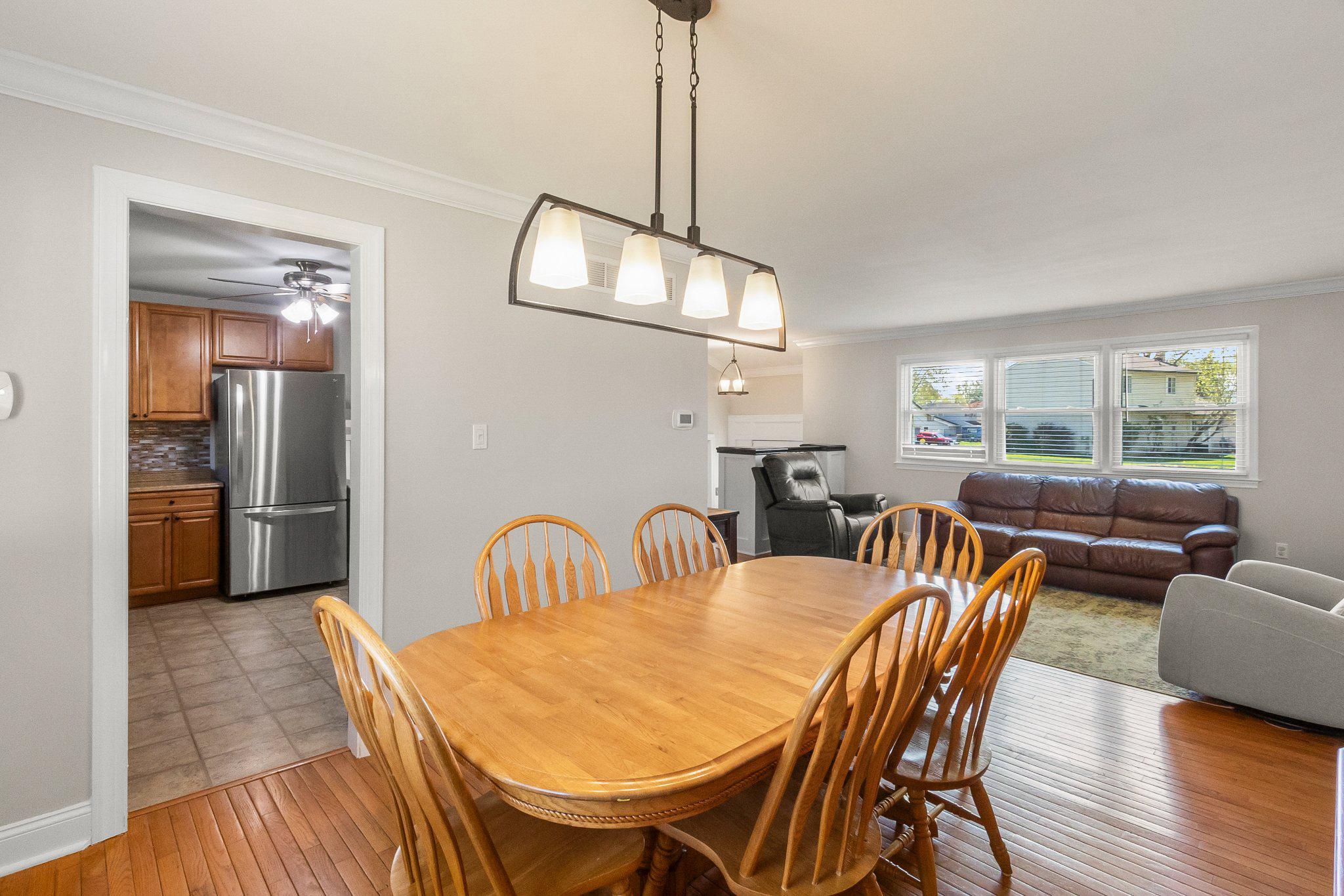 8 Slates End Newark, DE 19702 - Photo 24 of 54 a view of a dining room with furniture and a chandelier