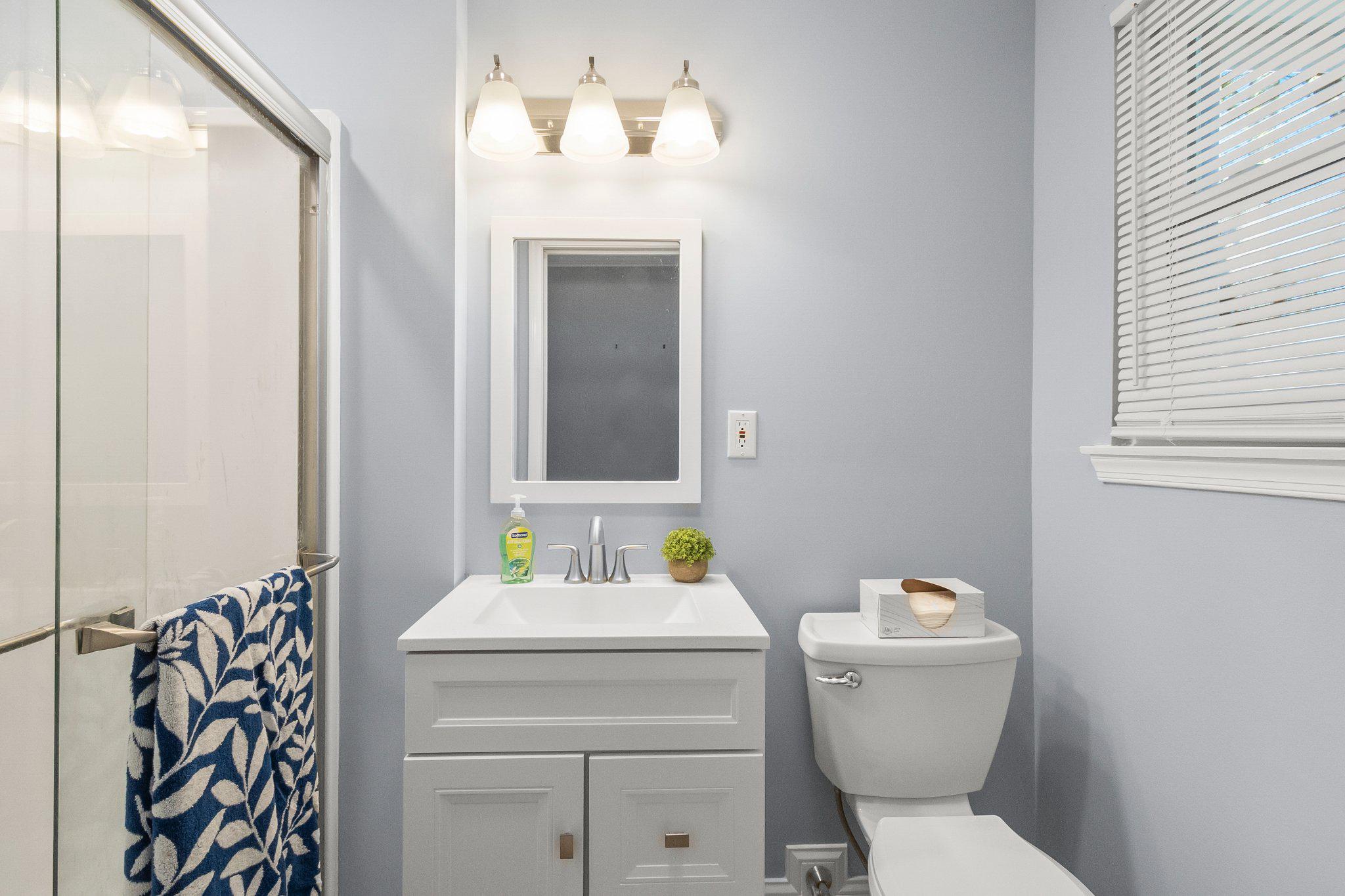 8 Slates End Newark, DE 19702 - Photo 29 of 54 a bathroom with a toilet sink and mirror
