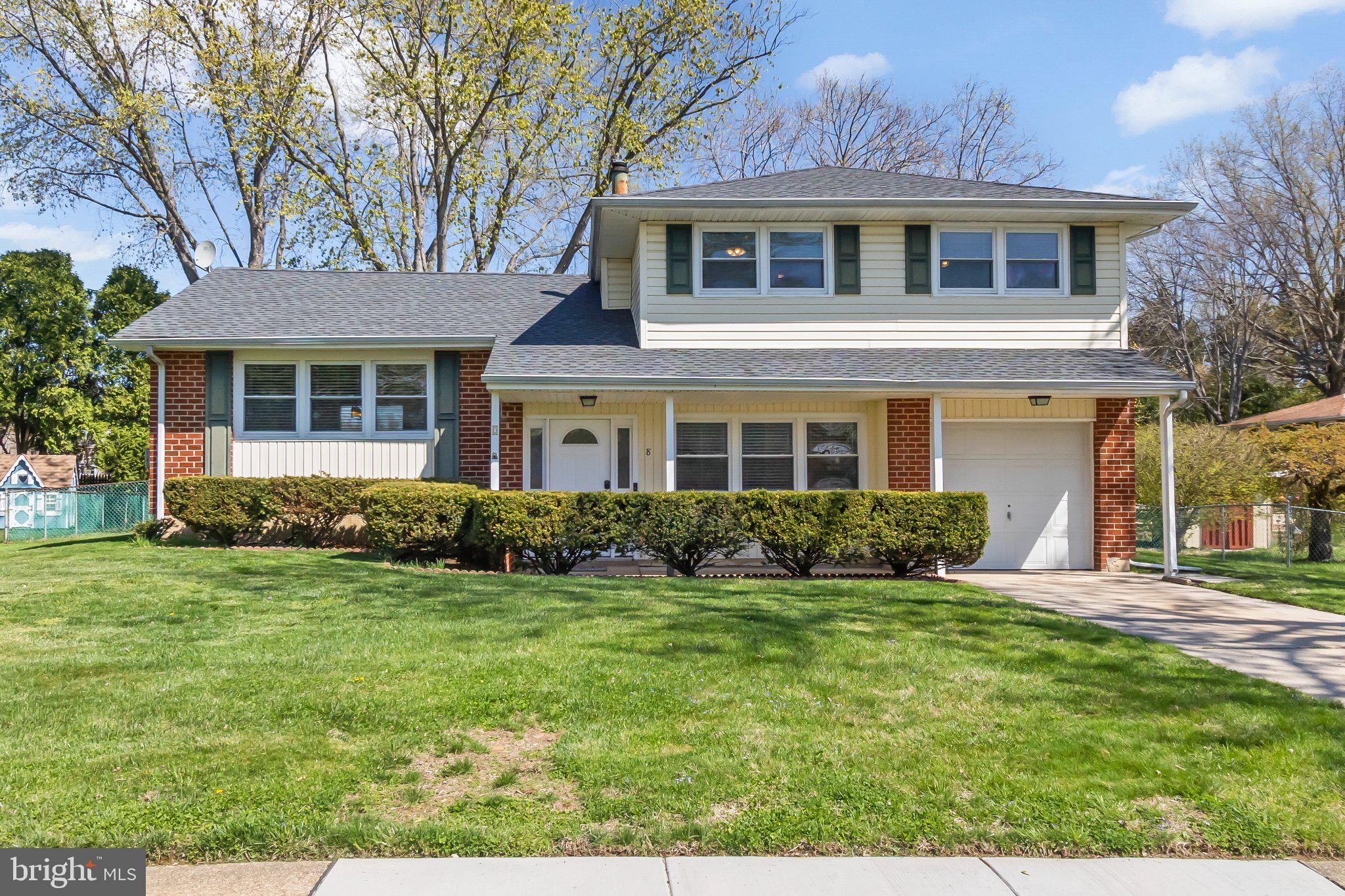 8 Slates End Newark, DE 19702 - Photo 3 of 54 a front view of a house with a yard