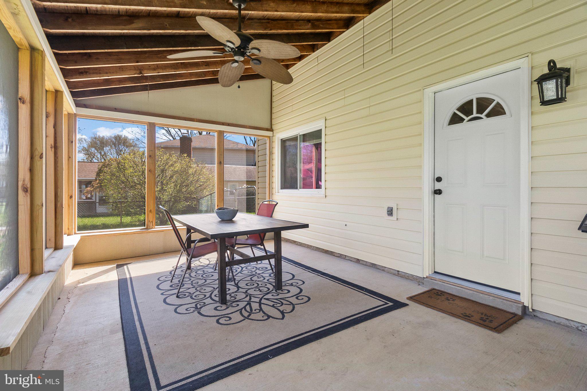 8 Slates End Newark, DE 19702 - Photo 41 of 54 a dining room with wooden floor and a table