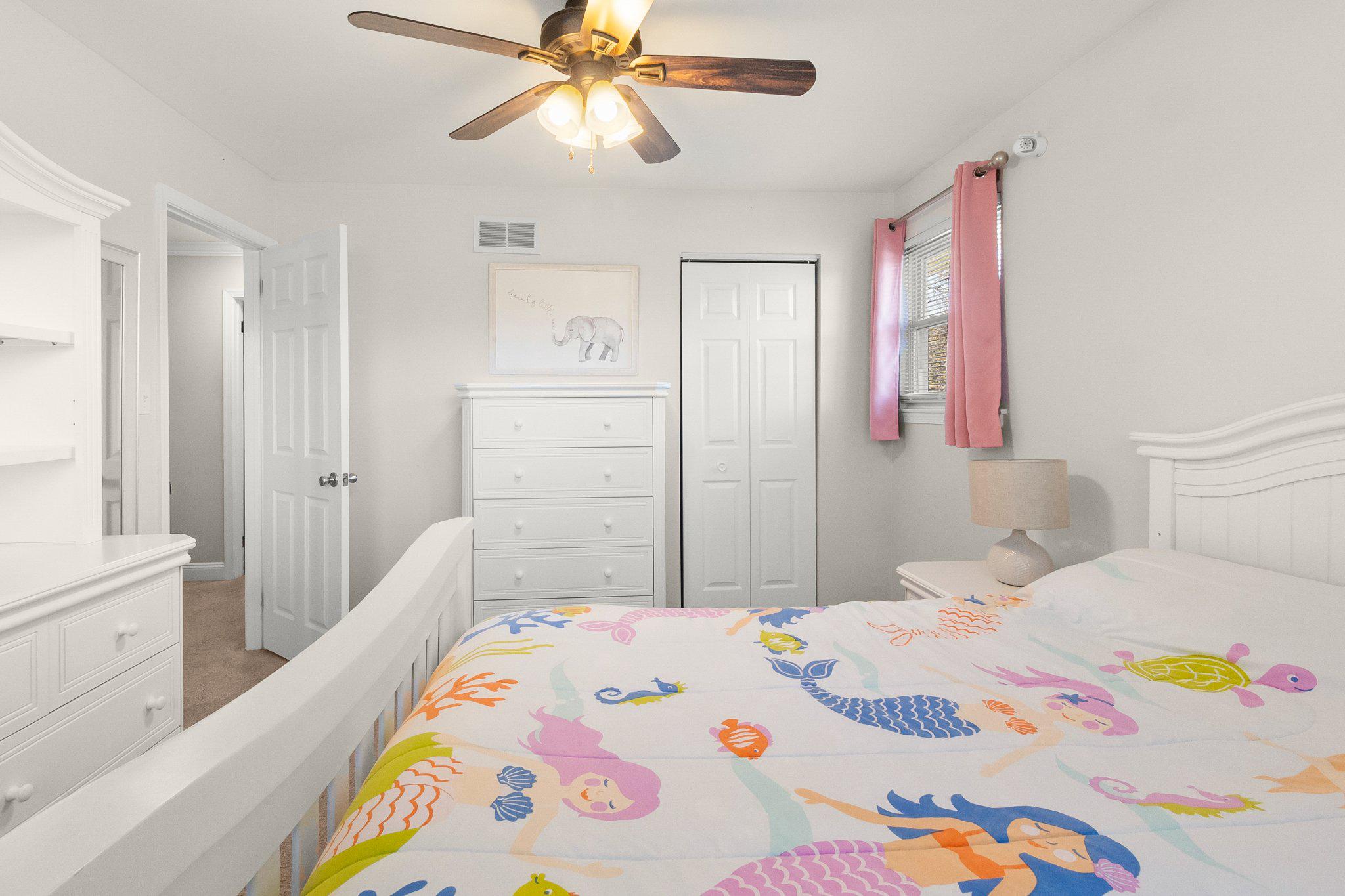 8 Slates End Newark, DE 19702 - Photo 51 of 54 a bedroom with a bed and a chandelier