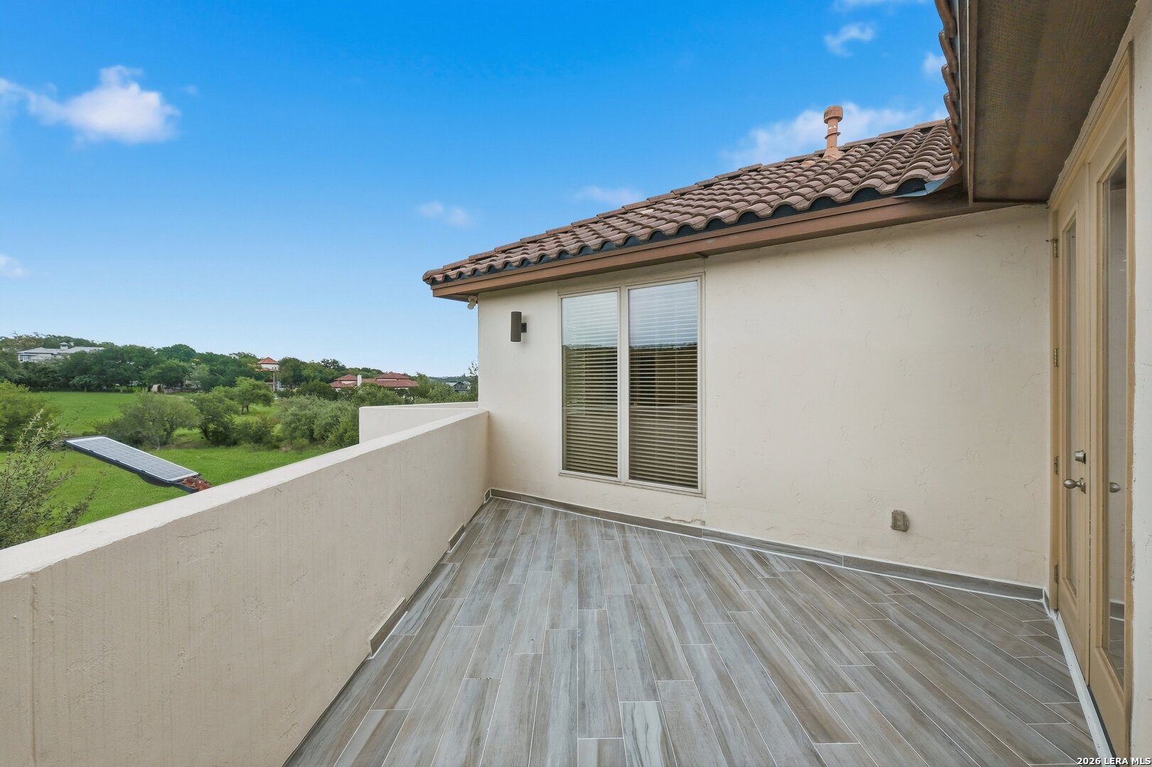 426 Legacy Ridge San Antonio, TX 78258 - Photo 33 of 38 a view of a balcony with wooden floor