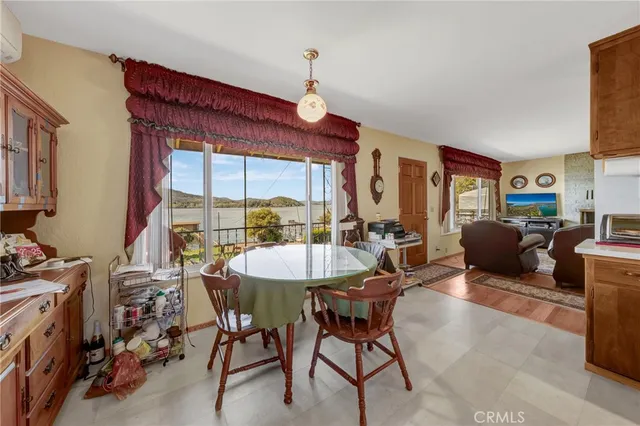 a kitchen with refrigerator and stove