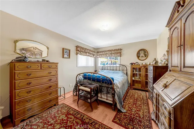 a kitchen with a refrigerator and a stove top oven