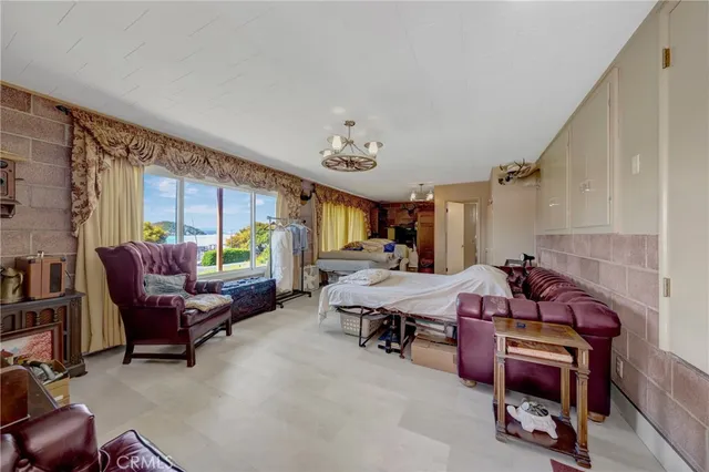 a bedroom with a bed and a table