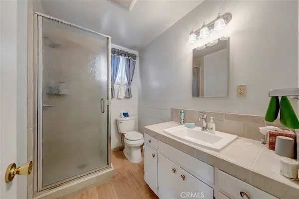 a bed room with furniture and a window