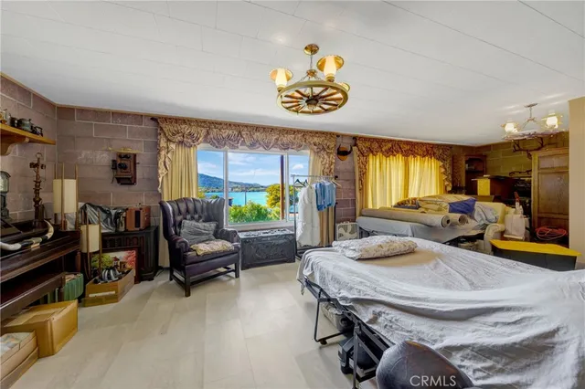 a front view of a house with a yard table and chairs