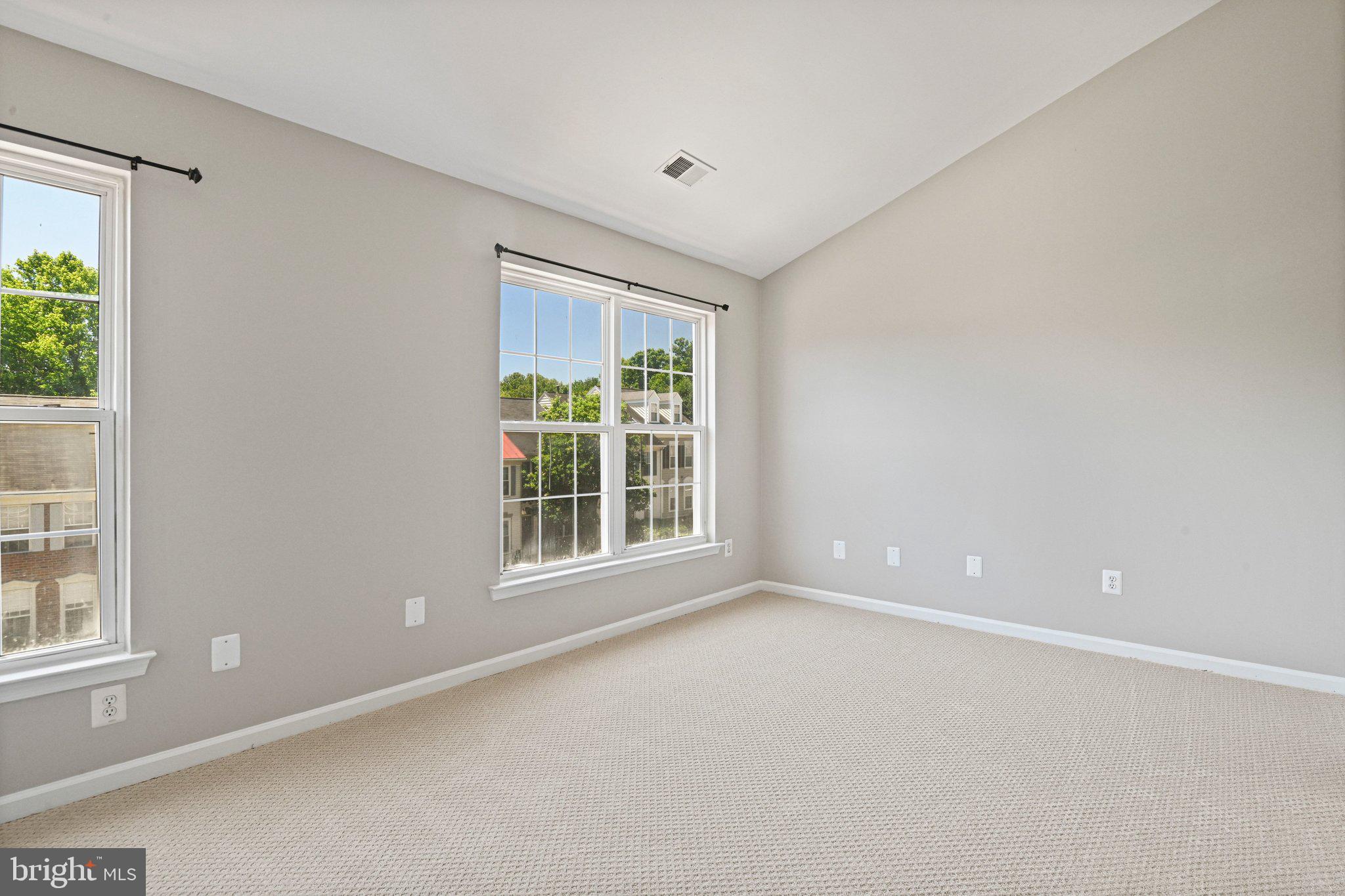 11482 Heritage Commons Way Reston, VA 20194 - Photo 17 of 31 Second bedroom suite w/vaultd ceiling