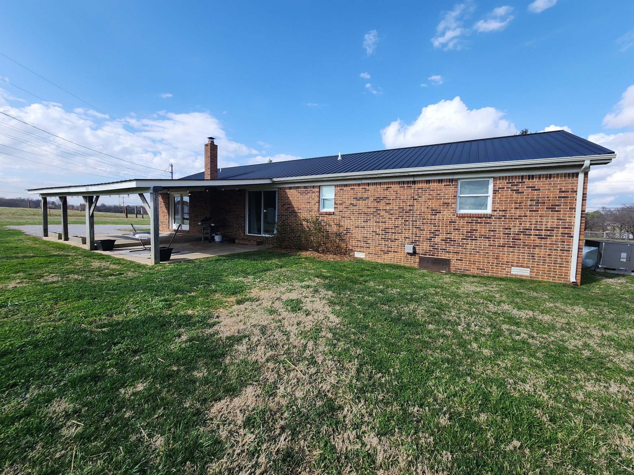 890 Tom Grissom Road Morrison, TN 37357 - Photo 17 of 17 a front view of a house with garden