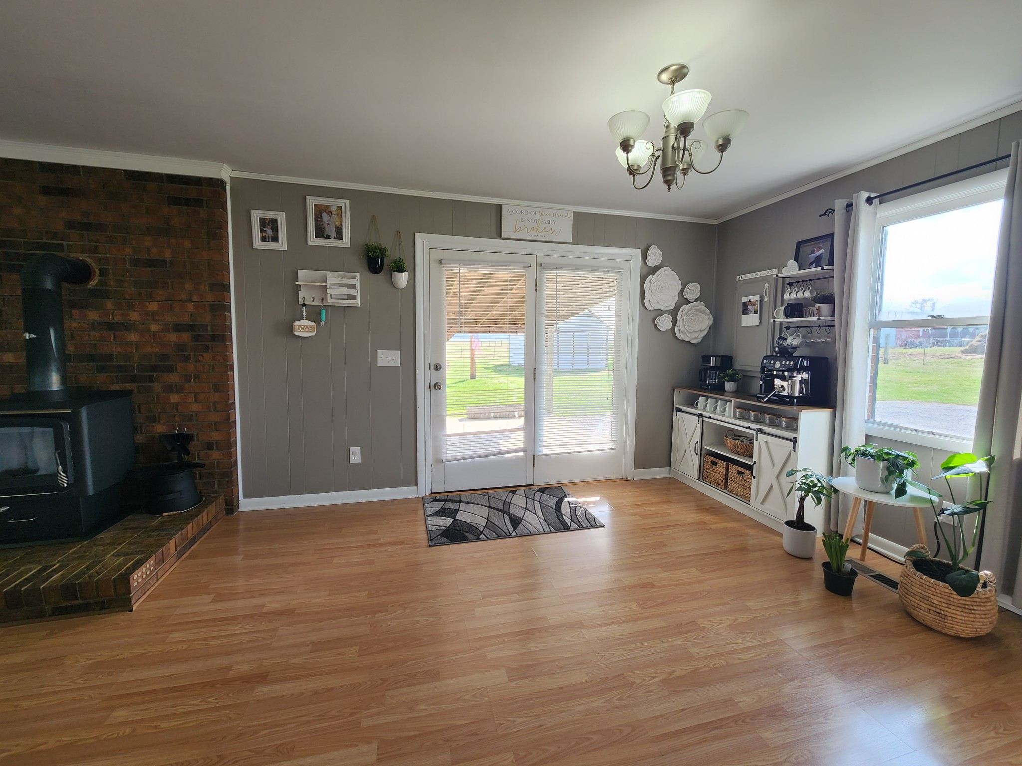 890 Tom Grissom Road Morrison, TN 37357 - Photo 5 of 17 a view of a livingroom with furniture window wooden floor and front door