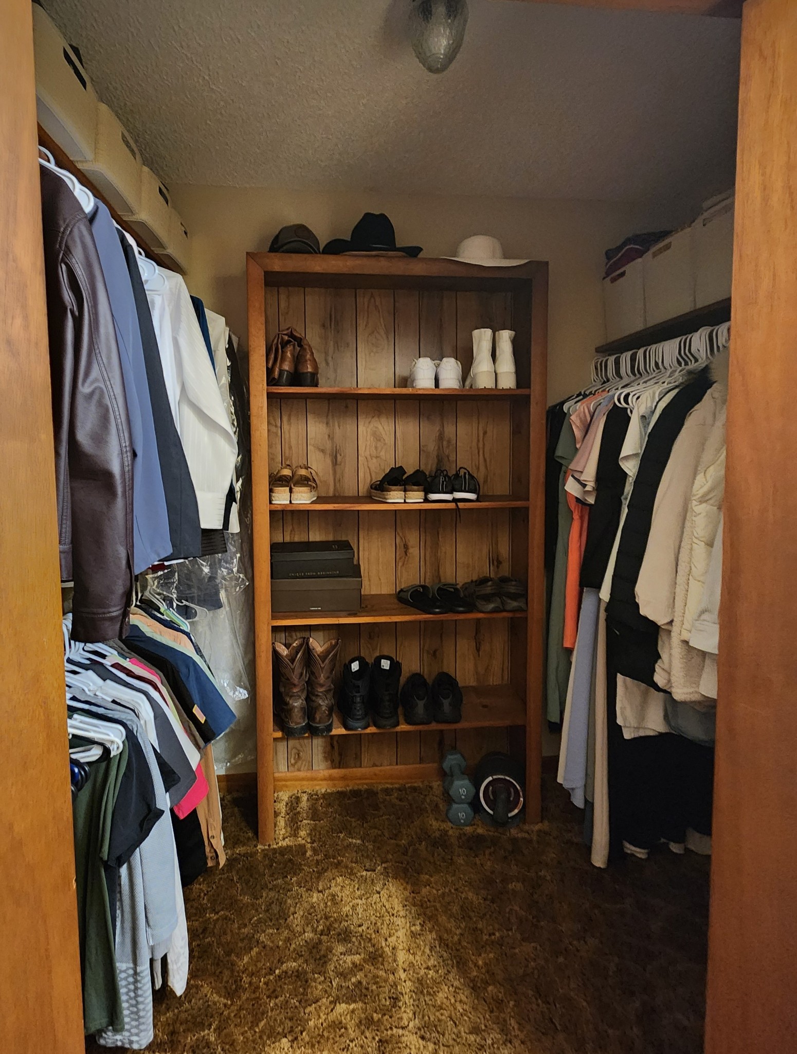 890 Tom Grissom Road Morrison, TN 37357 - Photo 10 of 17 a view of walk in closet with clothes and shoes