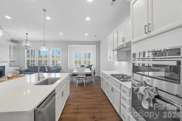 a kitchen with appliances and cabinets